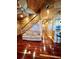 Living room with hardwood floors and staircase at 3001 Buccaneer Rd, Isle of Palms, SC 29451
