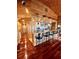 Open kitchen with island and hardwood floors at 3001 Buccaneer Rd, Isle of Palms, SC 29451