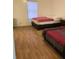 Two bedrooms with ample space and wood-look floors at 224 Ruth Anne Dr, Summerville, SC 29483
