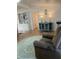 Spacious living room with wood-look floors and a built-in shelving unit at 224 Ruth Anne Dr, Summerville, SC 29483