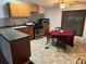 Bright kitchen with wood cabinets, tile backsplash, and a dining area at 224 Ruth Anne Dr, Summerville, SC 29483