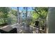 Relaxing balcony with wooden deck and outdoor seating at 9120 Parlor Dr, Ladson, SC 29456