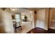 Bright living room with hardwood floors, a small table and chairs, and a couch at 9120 Parlor Dr, Ladson, SC 29456