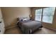Bright bedroom featuring a double bed and ample natural light at 9120 Parlor Dr, Ladson, SC 29456