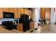 Modern kitchen with ample counter space and wood cabinets at 9120 Parlor Dr, Ladson, SC 29456