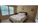 Charming bedroom with double bed and two windows at 9120 Parlor Dr, Ladson, SC 29456