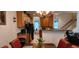 Modern kitchen with wood cabinets and black appliances at 9120 Parlor Dr, Ladson, SC 29456