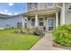 Landscaped front yard with flowers and plants at 1249 Woodsage Dr, Hanahan, SC 29410