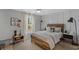 bedroom with rustic bed, geometric wall paneling, and playful decor at 702 Maynard Ln, Summerville, SC 29486