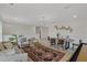 Bright game room with a pool table and comfortable seating area at 702 Maynard Ln, Summerville, SC 29486