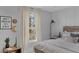 Cozy bedroom featuring a rustic wooden bed, large window, and a playful decor at 702 Maynard Ln, Summerville, SC 29486