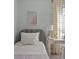 Charming bedroom with gray upholstered bed, desk, and patterned curtains at 702 Maynard Ln, Summerville, SC 29486