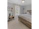 Serene bedroom with a wooden bed, light walls, and a fluffy rug at 702 Maynard Ln, Summerville, SC 29486