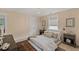 Bright bedroom with a queen bed, neutral decor, and plenty of natural light at 702 Maynard Ln, Summerville, SC 29486