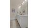 Clean bathroom with a double vanity and light color scheme at 702 Maynard Ln, Summerville, SC 29486