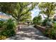 Picturesque community park featuring a central fountain, lush landscaping, and shaded seating areas at 111 Ashley Cove Way, Summerville, SC 29483
