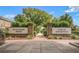 Hutchinson Square and Town of Summerville brick entrance with lush green trees at 111 Ashley Cove Way, Summerville, SC 29483