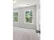 Charming bedroom with neutral walls and large windows at 111 Ashley Cove Way, Summerville, SC 29483