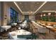 Upscale dining room with elegant tables, chairs, and lighting at 609 King St # 448, Charleston, SC 29403