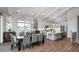 Open concept dining area with hardwood floors and kitchen views at 66 Cooper St, Charleston, SC 29403
