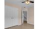 Bedroom with double doors and access to hallway at 124 Sweet Alyssum Dr, Ladson, SC 29456