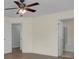 Bright bedroom with ceiling fan and access to bathroom at 124 Sweet Alyssum Dr, Ladson, SC 29456