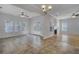 Sun-drenched dining room with tile floors and access to both kitchen and Gathering room at 124 Sweet Alyssum Dr, Ladson, SC 29456