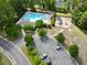 Aerial view of community pool, playground, and parking at 124 Sweet Alyssum Dr, Ladson, SC 29456