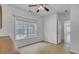 Bright bedroom with large window and ceiling fan at 124 Sweet Alyssum Dr, Ladson, SC 29456