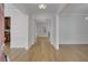Bright and spacious entryway with hardwood floors, offering a view into the living areas at 124 Sweet Alyssum Dr, Ladson, SC 29456