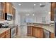 Spacious kitchen with island, stainless steel appliances, and ample cabinet space at 124 Sweet Alyssum Dr, Ladson, SC 29456