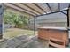 Relaxing hot tub on patio under pergola at 124 Sweet Alyssum Dr, Ladson, SC 29456