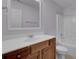 Bathroom with wood vanity and white bathtub at 124 Sweet Alyssum Dr, Ladson, SC 29456