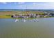 Aerial view of waterfront property with numerous boat slips at 2 Mcdonough Rd # F-2, Folly Beach, SC 29439
