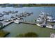 Aerial view of a full marina with many boats and slips at 2 Mcdonough Rd # F-2, Folly Beach, SC 29439