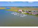 Aerial view of a large waterfront marina and community at 2 Mcdonough Rd # F-2, Folly Beach, SC 29439