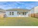 Nice backyard with a patio and AC unit at 4383 Ocean Farm Dr, Summerville, SC 29485