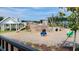 Charming community playground featuring a wooden ship and play area at 4383 Ocean Farm Dr, Summerville, SC 29485
