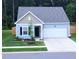 Newly built light blue house with two-car garage at 4383 Ocean Farm Dr, Summerville, SC 29485