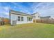 Spacious backyard with a large grassy area at 4383 Ocean Farm Dr, Summerville, SC 29485