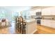Modern kitchen features white cabinets, granite counters, and stainless steel appliances at 340 Dickerson Ln, Summerville, SC 29485