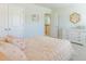 Spacious bedroom with a queen bed and access to upper level at 340 Dickerson Ln, Summerville, SC 29485