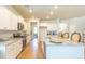 Bright kitchen boasts white cabinets, granite countertops and stainless steel appliances at 340 Dickerson Ln, Summerville, SC 29485