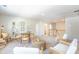 Bonus room with seating area, table, and access to bathroom and stairs at 340 Dickerson Ln, Summerville, SC 29485