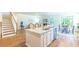 Open kitchen with large island, granite countertops and stainless steel appliances at 340 Dickerson Ln, Summerville, SC 29485