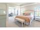 Main bedroom with king-size bed, built-in desk, and seating area at 340 Dickerson Ln, Summerville, SC 29485