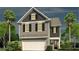 Two-story home with gray siding, white trim, and a two-car garage at 327 Dickerson Ln, Summerville, SC 29485