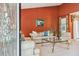 Living room with terracotta walls, comfy sofas, and coffee table at 1135 Harborgate Dr, Mount Pleasant, SC 29464