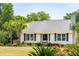 Front view of house with landscaping and palm trees at 1135 Harborgate Dr, Mount Pleasant, SC 29464