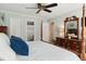 King-size bed in well-lit bedroom with en-suite bathroom access at 1135 Harborgate Dr, Mount Pleasant, SC 29464